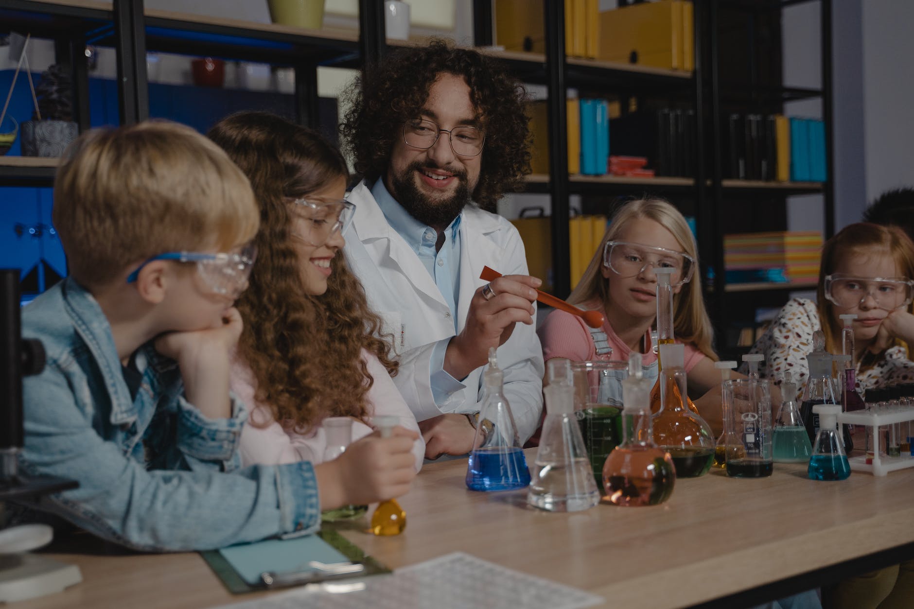 colored liquids on beakers and flasks