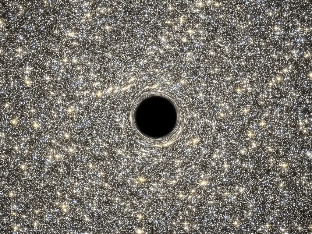 Hubble Helps Find Smallest Known Galaxy Containing a Supermassive Black Hole