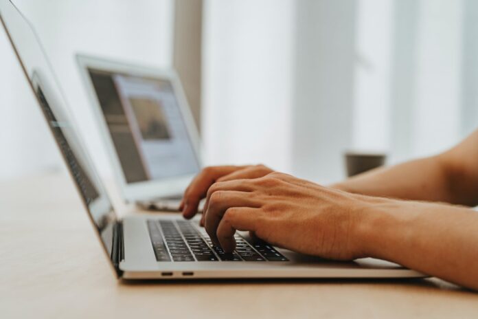 person using a macbook air