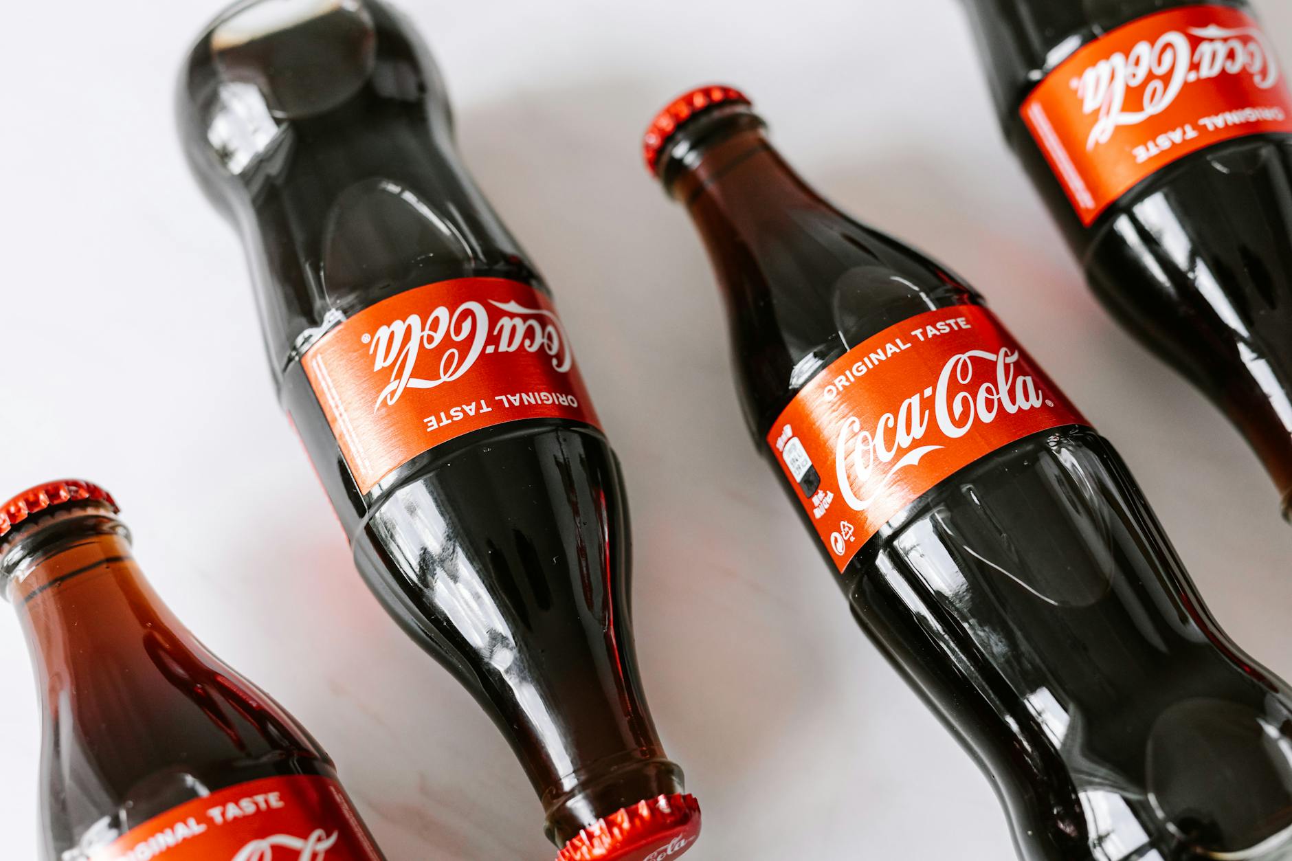 bottles of soft coke drink on white background